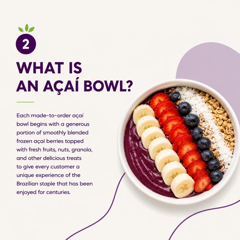 A vibrant açaí bowl topped with sliced bananas, strawberries, blueberries, granola, and coconut flakes.